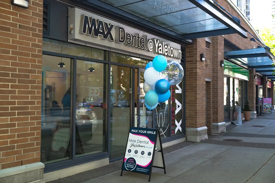 max-dental-your-dentist-in-yaletown-bc Womens Clicking Selfie